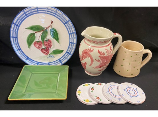A Group Of Ceramic Items.