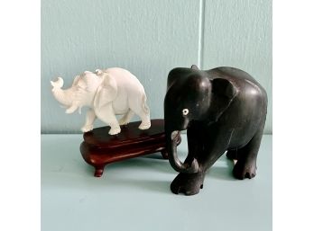 A Pair Of Carved Elephants - One On Wood Base