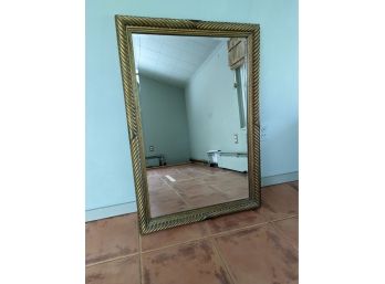 A Large Gold Tone Framed Mirror