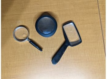 A Trio Of Magnifying Glasses