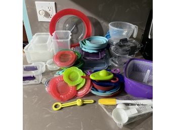 A Very Large Assortment Of Food Savers And Containers To Keep Food Fresh