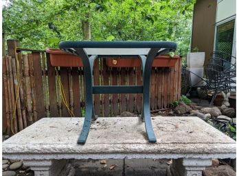 A Small Outdoor Cast Aluminum Side Table
