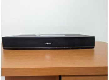 A Bose Solo TV Sound Bar With Bose Universal Remote