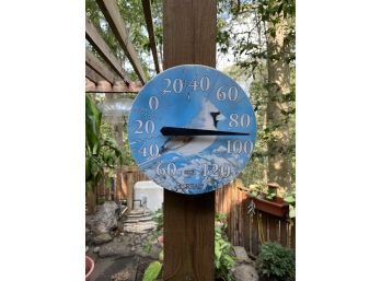 A Color Faded Cardinal Thermometer