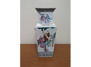 A Chinese Porcelain Vase With Traditional Scenes