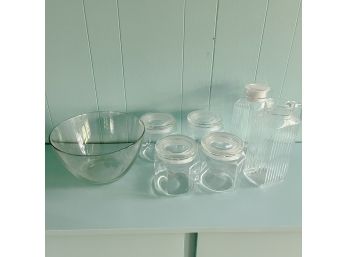 A Set Of Glass Containers With Lids And Bowl