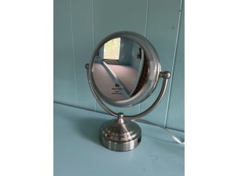 A 8x Mag Vanity Mirror With Light