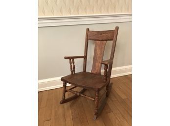 Vintage Wooden Childs Rocking Chair With Carved Accents