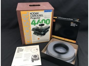 Vintage Kodak Carousel 4600  Slide Projector  With Like New Carousel - Powers On & 8 Extra Carousels