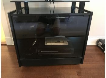 Black Lacquer TV Stand With Push Open Glass Doors - On Wheels