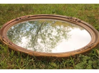 A Whimsical Oval Mirror By Carolina Mirror Company