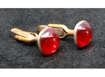 Pair Of Golden Cufflinks With Red Stones