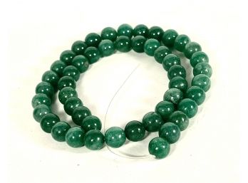 Strand Of Hard Stone Polished Green Beads