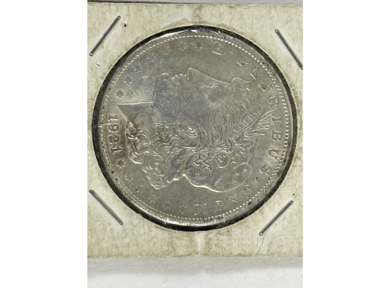 A NEAR MINT 1921 MORGAN SILVER DOLLAR