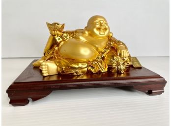 Golden Buddha On Wood Base
