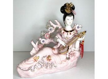 Asian Porcelain Statue