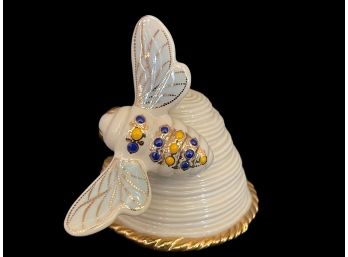 A Miniature Lenox Secret Garden Beehive Collection Porcelain & Gold Figure