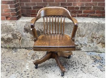 A Fantastic Early 20th Century B.L. Marble Company Oak Rolling Swivel Chair