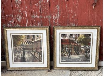 A Pair Of Framed Cafe Scene & Walking In Rain Prints