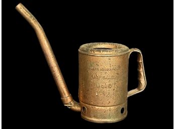 An Antique Swing Spout Half Gallon Copper Oil Can