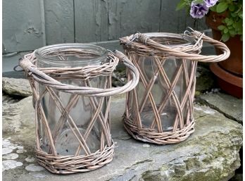 A Pair Of Wicker And Glass Candle Sconces
