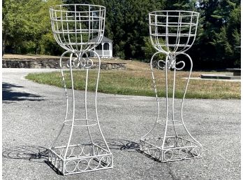 A Pair Of Antique Wrought Iron Plant Stands