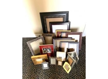 Assortment Of 21 Picture Frames In Various Shapes And Sizes