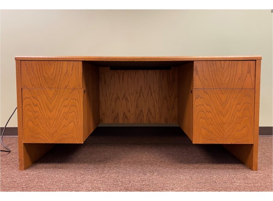 An Oak Laminate Kneehole Desk