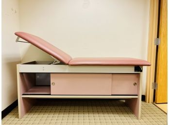 A Cabinet-Style Treatment Table With Adjustable Back #2