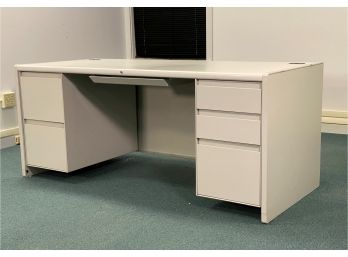 An Office Desk By Steelcase With Side & Center Drawers