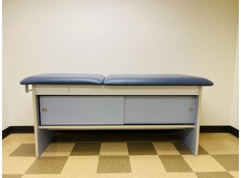 A Cabinet-Style Treatment Table With Adjustable Back #3