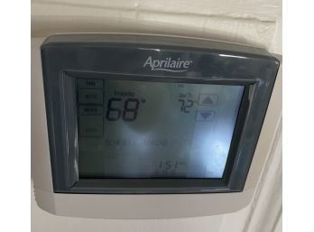 A Pair Of  Aprilaire Touchscreen Multi Stage Thermostats And 3 Honeywell T-stats