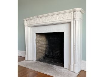 A Louis XVI Style White Stone Mantle With Fluted Column Jambs