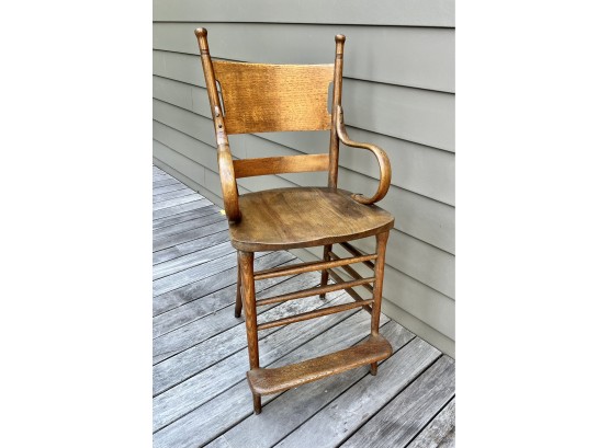 An Antique Oak Barber's Chair