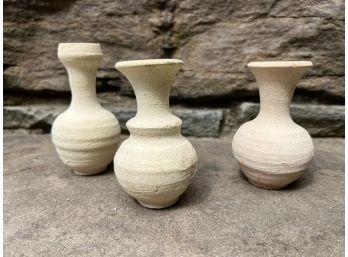 A Set Of Three Earthenware Vases