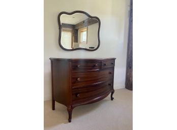 A Handsome Antique Bow Front Dresser With Matching Mirror