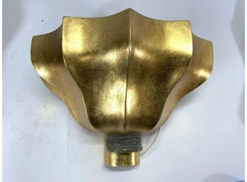 A Contemporary Wall Sconce In Gold Leaf
