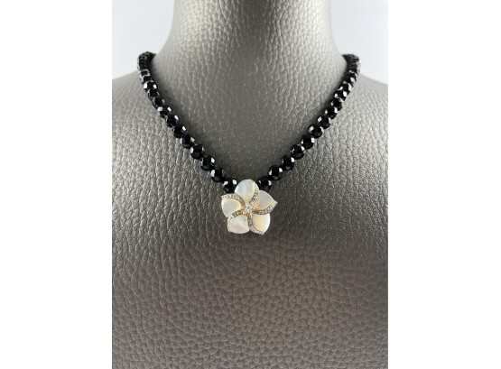 A Mother Of Pearl And Gold Pendant On Onyx Bead Necklace Plus 5 More Pieces
