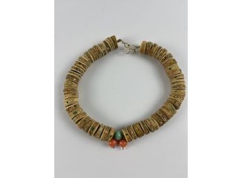 A 17' Flat Beaded Choker With Coral And Turquoise Center