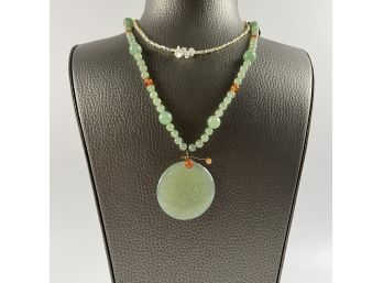 A Jade, Aventurine And Carnelian Pendant Necklace And A Delicate Choker Of Pearl And Citrine