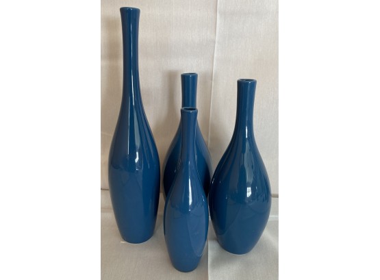 Four Blue Bud Vases