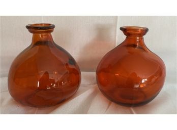 Two Orange Glass Vessels