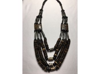 Vintage Earth-tone Multi-strand Featuring Carved Beads