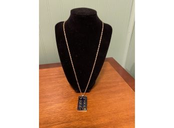 Very Nice Piece Of Costume Jewelry That Has An Egyptian Themed Pendant In Black And Gold Tone
