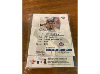 2 Stacks Of Baseball Trading Cards From Topps And Fleer Including Mike Piazza