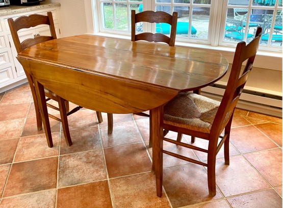Antique French Oval Drop Leaf Table And Three Chairs