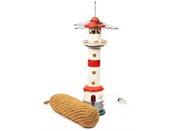 A Fun Tin Lighthouse (Lights Up) With A Seagrass Bouy