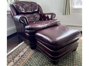 Dark Wine Button Tufted Leather Club Chair With Brass Nailhead Detail And Matching Ottoman