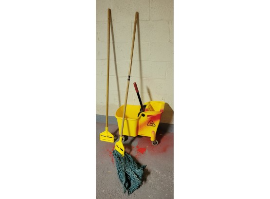 Mop Bucket And 2 Mops                   (Loc Laundry Room)
