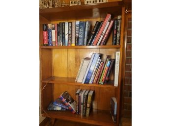 Full Bookshelf Of Books.  Most Are Hardcover.              (Loc:  Family Room)